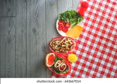 Outdoor Summer Cookout Food On A Wooden Table.