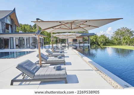 outdoor swimming pool sun loungers