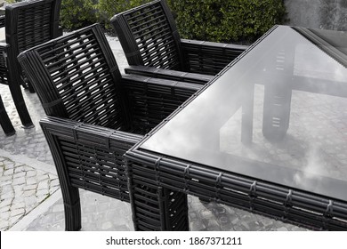 Outdoor Table With Glass Top And Chairs Set Made Of Black Rattan