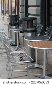 Outdoor Tables In A Restaurant With A Warm Heater. Cafe Summer Veranda