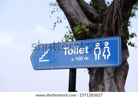 An outdoor toilet sign, public toilet sign . Toilet sign - Restroom Concept. WC  Toilet icons set. Men and women WC signs for restroom.