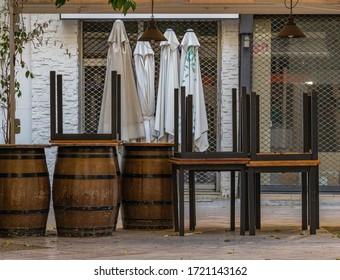 Outdoor Typical Mediterranean Restaurant Terrace Closed Due To Coronavirus Pandemic. Concept For Tourism Crisis, Economic Crisis, Restaurant Closed, No People During Covid Shut Down.