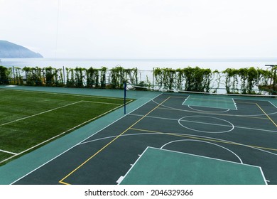 Outdoor Volleyball Court With A Net In The Morning Next To The Sea.