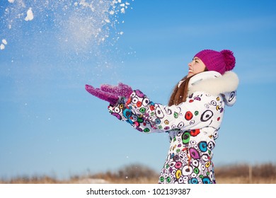 Outdoor winter portrait of beautiful smiling young girl - Shutterstock ID 102139387
