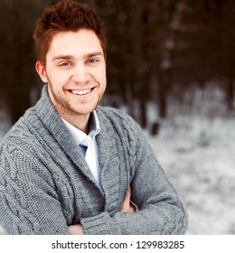 Outdoor Winter Portrait Of Happy Young Smiling Man