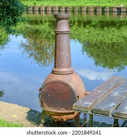 Outdoor Wood Burner Near A Canal