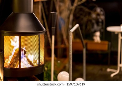 Outdoor Wood Stove With Burning Open Fire (night)