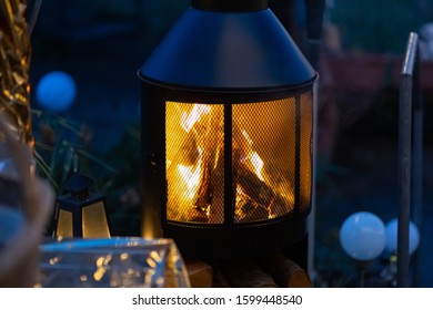 Outdoor Wood Stove With Burning Open Fire