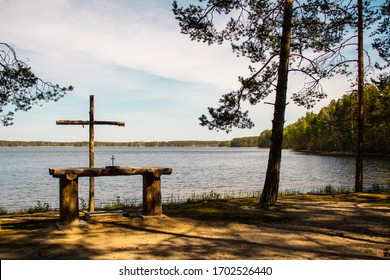 Outdoor wooden altar on the edge of the lake and the forest. Perfect place to celebrate mass or wedding. Finland