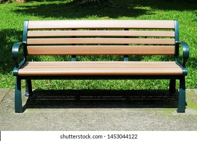 Outdoor Wooden Bench Isolated in the City Park