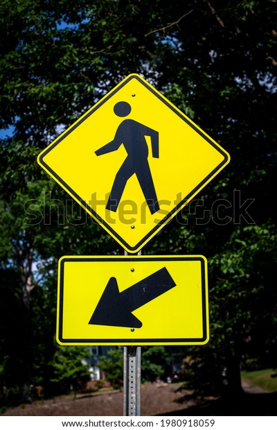 outdoor yellow\
pedestrian crossing sign\

