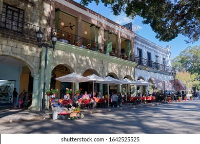 Outdoors Cafe And Patio Restaurant, In Colonial Architecture, On The Centre Square Of Oaxaca, Mexico. February 8, 2020