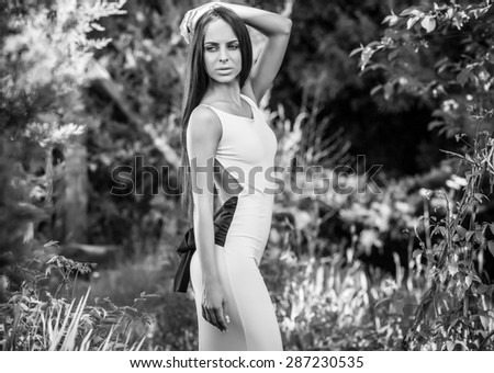 Similar – Young woman doing yoga in nature