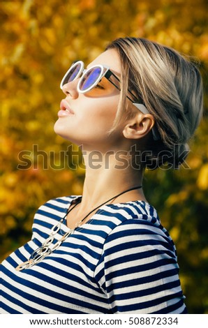 Similar – Happy young woman looking through the window car