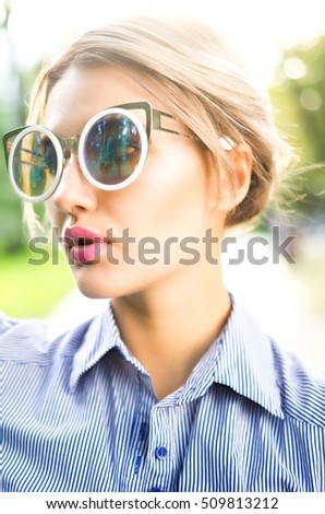 Similar – Happy young woman looking through the window car