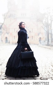 Outdoors Portrait Of A Victorian Lady In Black