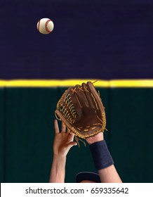 Outfielder Hand Catching Baseball