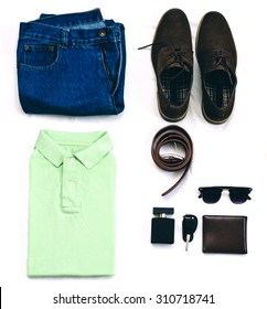 Outfit Of Clothes Young Man With Vintage Blue Jeans, Green Polo Shirt, Brown Suede Shoes, Clubmaster Sunglasses, Purse And Other On The White Background