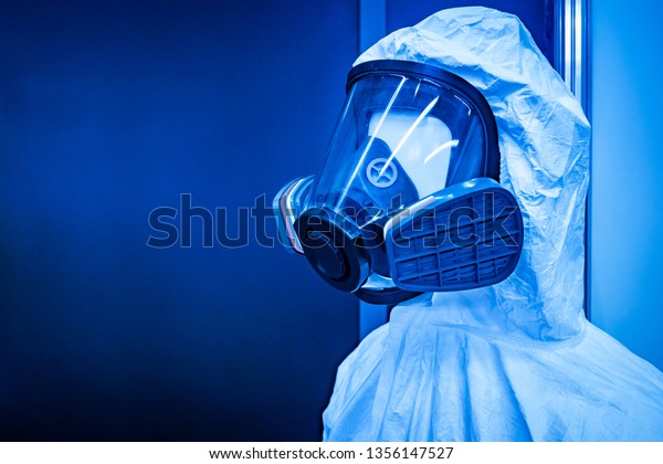 Outfit of gas mask with a\
panoramic mask. Filter respirator. Chemical protection. Respiratory\
protection against toxic substances. Personal protective\
equipment.