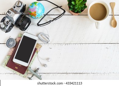 Outfit Of Traveler On White Wooden Background And Copy Space, Travel Concept