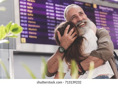 Outgoing Old Man Hugging Girl On Meeting