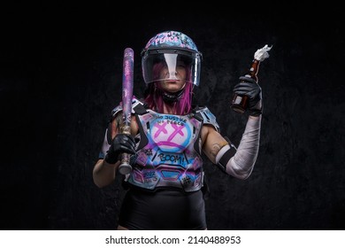 Outlaw Woman Protester With Molotov Cocktail Against Dark Background