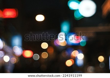 Outof focus view of illuminated street at night