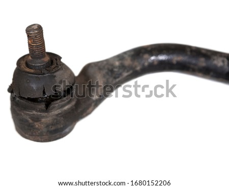 Out-of-service one rusty tie rod end with old cut rubber, isolated on white background
