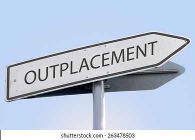 OUTPLACEMENT word on road sign