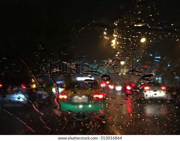 Outside the car in the rain\
night day