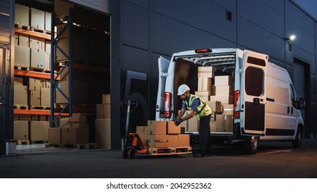 Outside of Logistics Distributions Warehouse Delivery Van: Worker Unloading Cardboard Boxes on Hand Truck, Online Orders, Purchases, E-Commerce Goods, Food, Medical Supply. Evening Shot - Shutterstock ID 2042952362