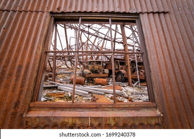 Outside Looking Into A Collapsed Airplane Hanger In Greenland. 