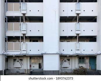 Outside Old Apartment With Hallway Of Each Floor View. Old Apartment Atmospheres In Japan.