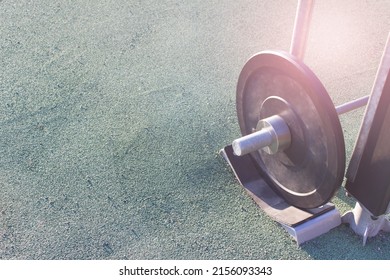 Outside Sport, Workout Gear - Heavy Weights On Green Artificial Grass Surface. Image With Copy Blank Space. 