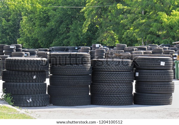 Outside storage warehouse with new and second hand\
car tires