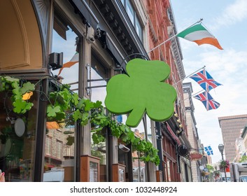 Outside Street View Of Irish Pub Decorated With Shamrocks For St Patricks Day