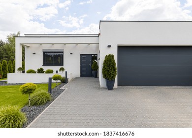 Outside View Of Elegant Suburban House With Big Window Green Lawn