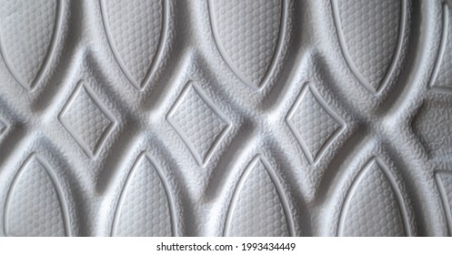 The outsole of new white sneakers. Rubber sole for men's shoes. Sole for sports and walking shoes. The texture of the material of sports shoes.