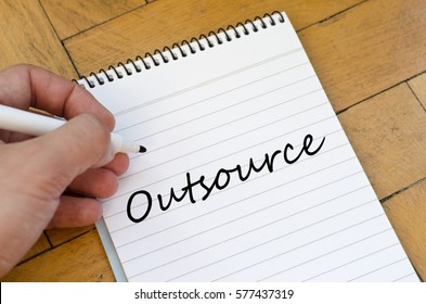 Outsource text concept write on notebook