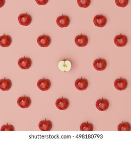 Outstanding Red Apple Middle Around Half Apples On Red Pastel Background. Flat Lay