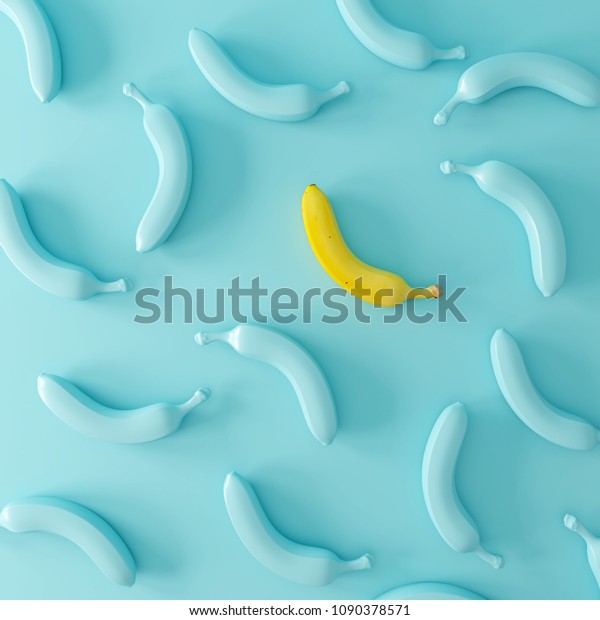 パステル青の背景に青いバナナの中で目立つ黄色のバナナ 最小コンセプ の写真素材 今すぐ編集
