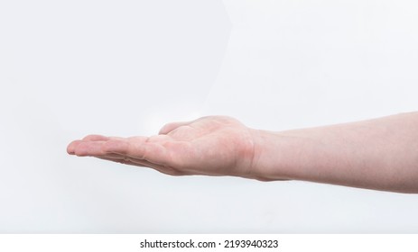outstretched male hand, isolated on white background - Shutterstock ID 2193940323