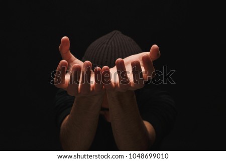 Similar – depressed man closes his eyes with his hands