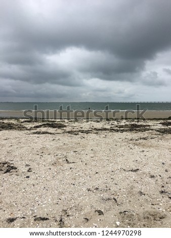 Outview over the beach with a cloudy sky
