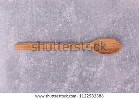 An oval wooden spoon