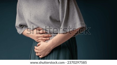Ovarian and Cervical Cancer. Woman Touching on Lower Abdomen in Pain, Female Reproductive System, Uterus, Women's Health, PCOS and Gynecology 