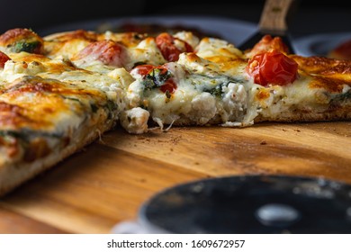 Oven Baked Vegetarian Pizza On Wooden Pizza Peel