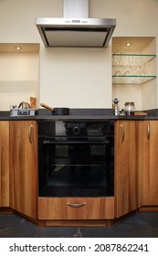 Oven And Electric Hob With Extractor In A Small Chic Custom Kitchen