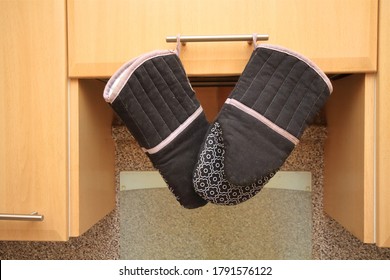 Oven Gloves Hanging In The Kitchen