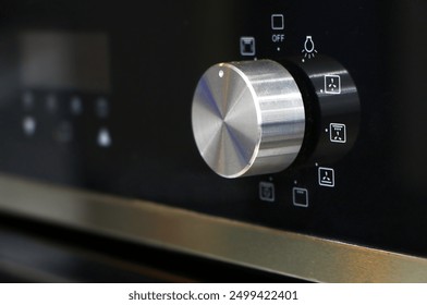 Oven knob controller with multi-function settings from side view